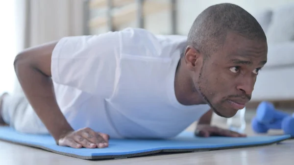 Close up of African Man doing Pushups — Stockfoto