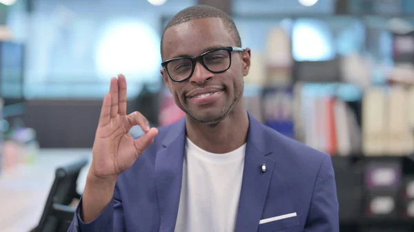 Portrait of Young African Businessman Showing Ok Sign — Stockfoto