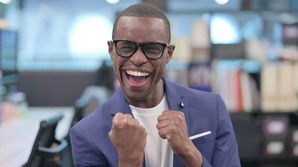 Portrait of Successful Young African Businessman Celebrating — Stockfoto