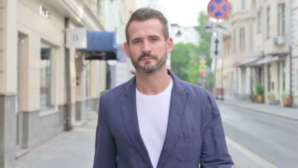 Close up of Man Walking Down the Street — Stock video