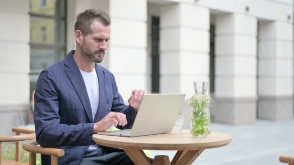 Man having Neck Pain while Typing on Laptop — Stock Video