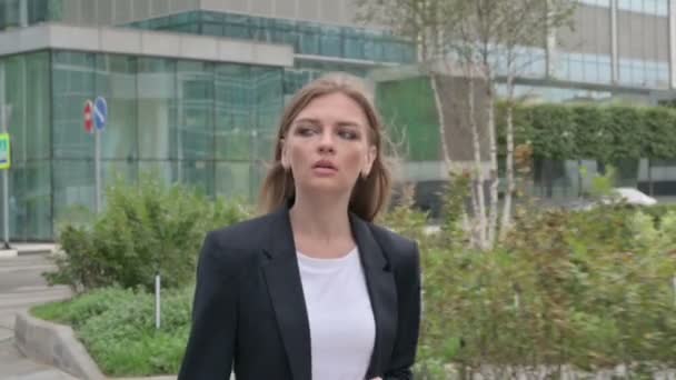 Young Businesswoman Walking on the Street in Slow Motion — Stock Video