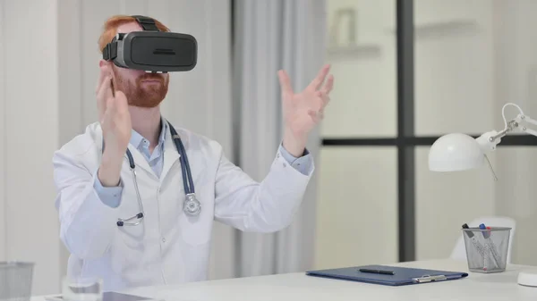 Young Redhead Male Doctor using VR Set — Stock Photo, Image