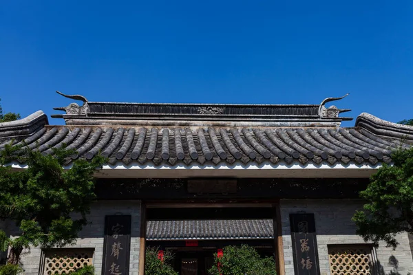 Chinese ancient buildings and house under the blue sky.