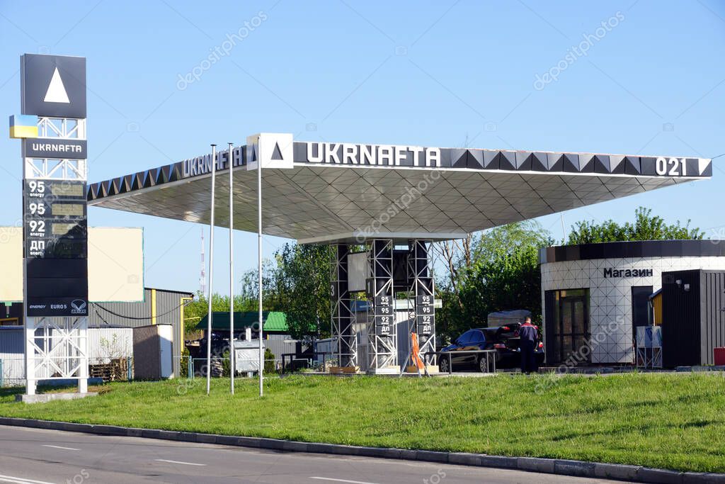 Khmelnitsky, Ukraine - May 23, 2021: Ukrnafta gas filling station. Ukrnafta is a Ukrainian oil and natural gas extracting company.