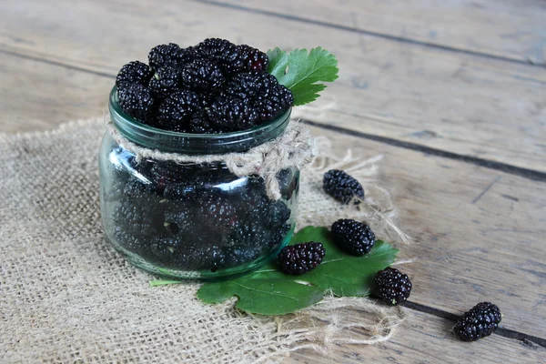 Mulberry berries in a jar — Stock Photo, Image