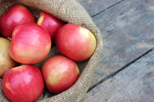 Apples in a bag lying — Stock Photo, Image