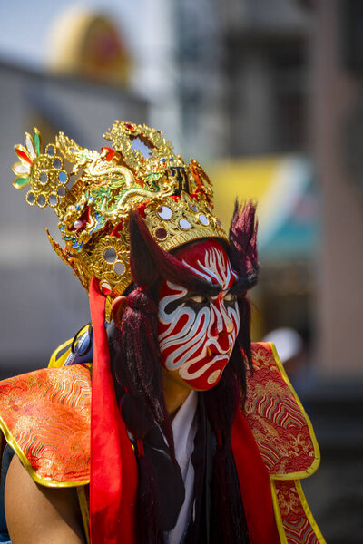 the classic attire and demeanor of the Ba Jia Jiang (The Eight Generals) troupe. Ba Jia Jiang is a common temple parade formation in Taiwan and the Minnan region