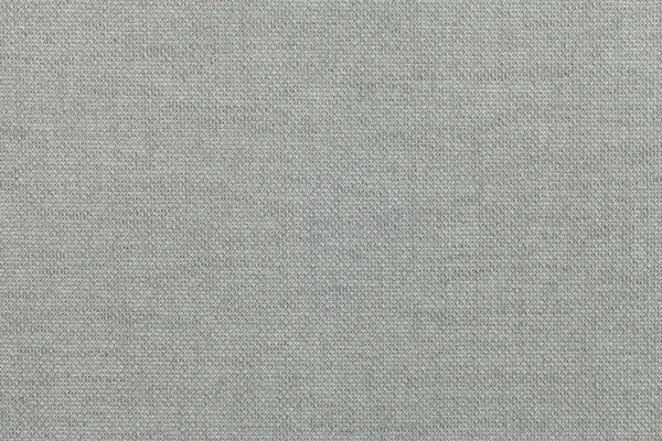 Gris clair, fond d'une matière textile. Tissu à texture naturelle. Contexte : . — Photo