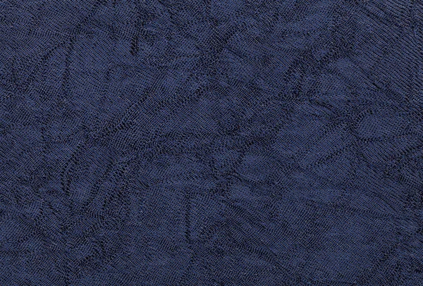 Bir tekstil malzemeden koyu mavi dalgalı arka plan. Doğal doku closeup ile kumaş. — Stok fotoğraf
