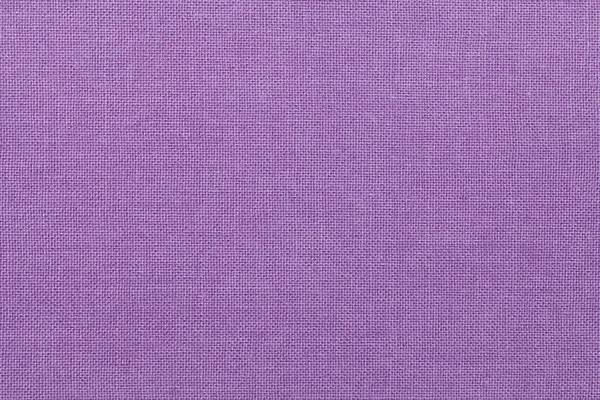 Hellvioletten Hintergrund aus einem textilen Material. Stoff mit natürlicher Textur. Hintergrund. — Stockfoto