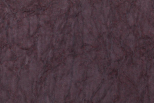 Dunkelvioletten welligen Hintergrund aus einem textilen Material. Stoff mit natürlicher Textur Nahaufnahme. — Stockfoto
