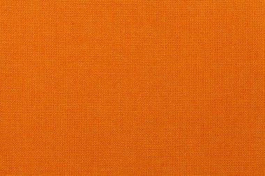 Tekstil malzemesinden parlak turuncu arka plan. Doğal dokulu kumaş.