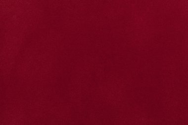 Koyu kırmızı süet kumaş portre. Kadife doku.