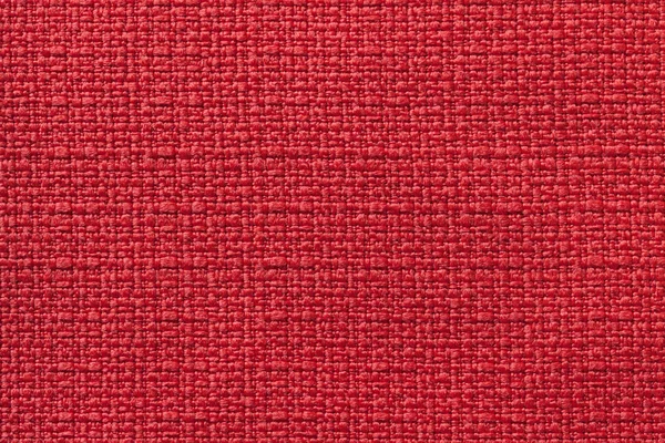 Fundo vermelho claro de uma matéria têxtil. Tecido com textura natural. Contexto . — Fotografia de Stock