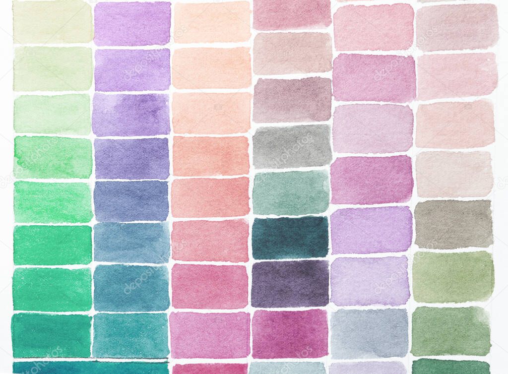 Palette of shades watercolors different colors painted on white paper. Sample of paint spectrum. Drawing pattern and artist background.