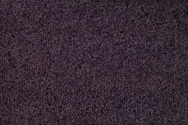 Dark purple fluffy background of soft, fleecy cloth. Texture of violet wool textile backdrop, closeup. clipart