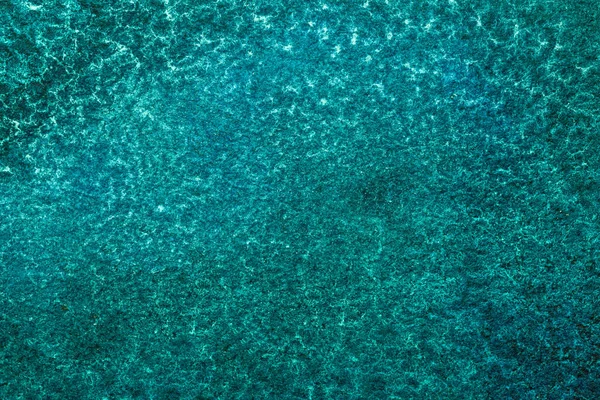 Abstract art background light blue and turquoise colors. Watercolor painting on canvas with emerald stains and gradient. Fragment of artwork on paper with water pattern. Texture backdrop.