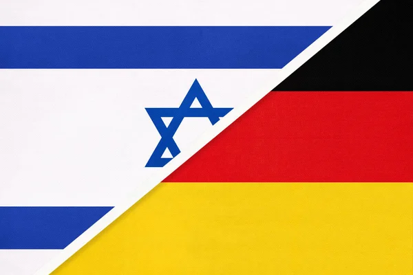 Israel and Germany, national flags from textile. Relationship, partnership and match between two countries.