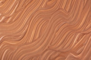 Soyut akışkan sanat arka planı koyu kahverengi renkler. Sıvı mermer. Bej renkli tuvalde akrilik boya. Dalgalı şekilli suluboya arkaplan. Ton kremi.