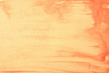 Soyut sanat arka plan açık mercan ve şeftali rengi. Portakal rengi fırça darbeleriyle suluboya boya boya. Kağıt üzerinde fırça darbesi desenli akrilik çizimler. Taş zemin.