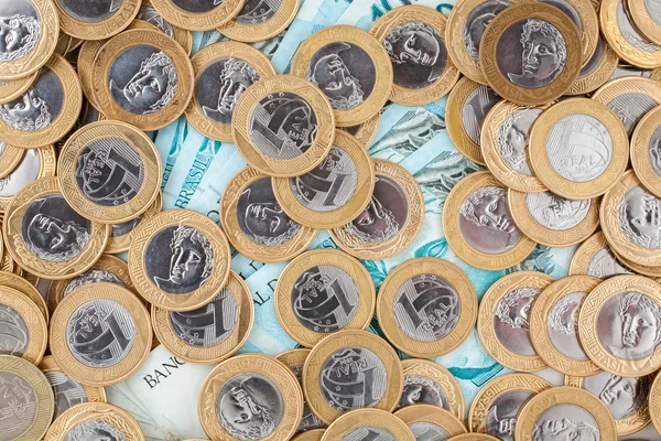 Brezilya 1 gerçek sikke ve 100 Reali banka notları