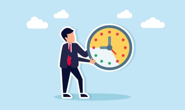 İş projesinin zaman çizelgesi ve son teslim tarihinin izlenmesinin kullanım göstergesi olan bir işadamı saati tutuyor