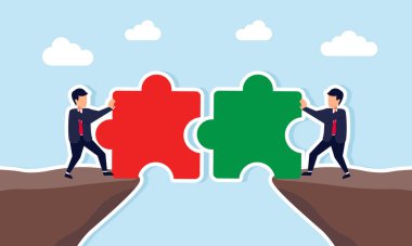 İki iş adamı ayrı kayalıklarda yapboz parçalarını bir araya getiriyorlar.