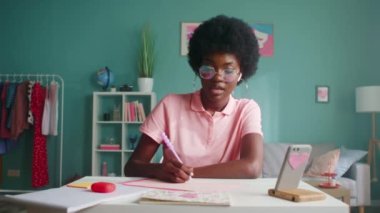 Woman Is Making Notes, Having Video Call