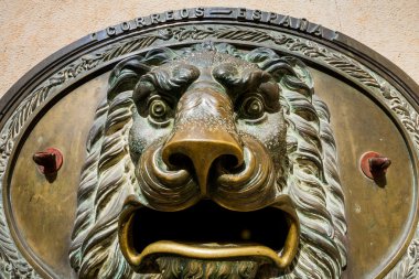 Cuenca, Castile La Mancha, Spain, particular of lion in the foun clipart