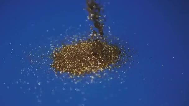 Golden Glitter Funkelndes Magisches Licht Goldglitzernde Staubpartikel Funkeln Auf Blauem — Stockvideo