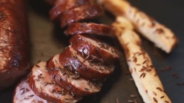 Sprinkle Cumin Sliced Sausage Bread Tray Rotates Selective Focus — Stock Video