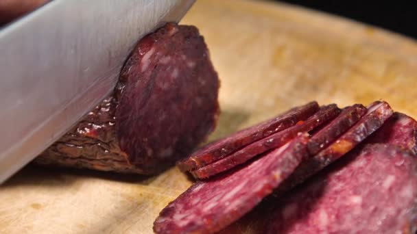 Cut Salami Sausage Thin Slices Close View Hand Slicing Meat — Vídeo de Stock