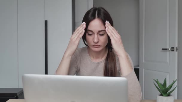 Depressed desperate woman feeling worried about financial problem doing paperwork. Stressed businesswoman looking frustrated thinking of money debt, budget loss, bankruptcy sitting at home office desk — Stock Video