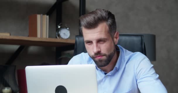 Attractive businessman looking worried and tired infront of laptop. Businessman Sleeping at Work — Stock Video