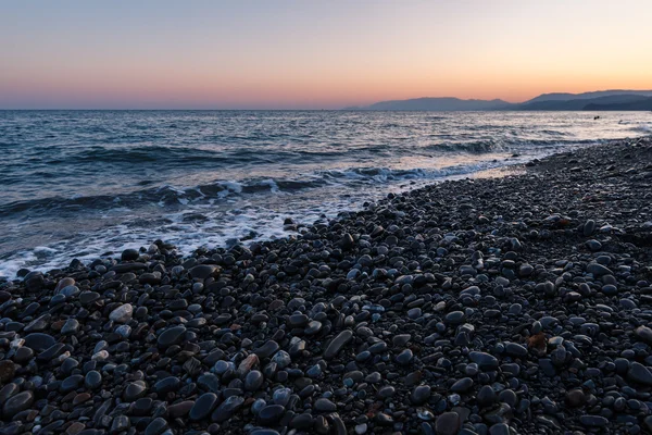 Deniz kıyısında gün batımı 