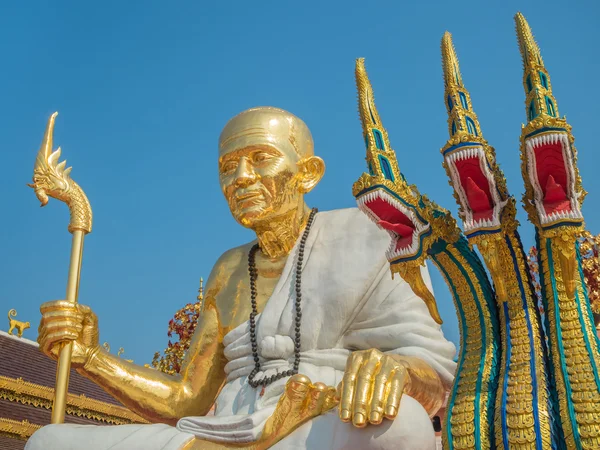 Golden Monk Statue and Three Heads Serpent — Stock Photo, Image