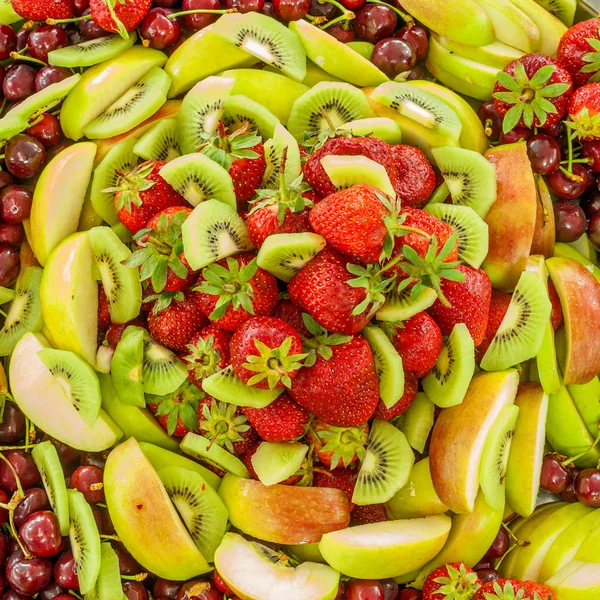 Banyak buah yang berbeda di piring
. — Stok Gambar Banyak buah yang berbeda di piring
. Stok Gambar