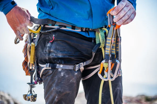 Climbing equipment on man