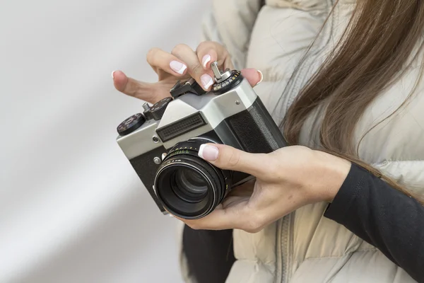 vintage camera in the hands of girl