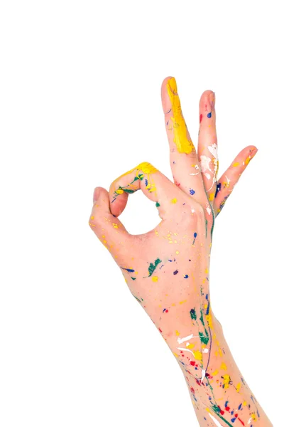 Mujer mano en pintura con símbolo ok — Foto de Stock