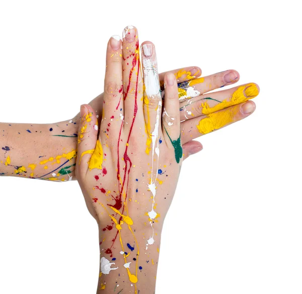 Woman hands in paint make a free shape — Stock Photo, Image