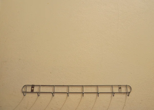 Duvar Askı üzerinde sarı çimento