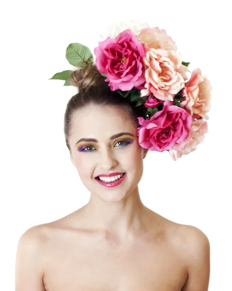 Close-up van portret van een mooie vrouw met bloemen, van multicolor oogschaduw make-up Rechtenvrije Stockfoto's