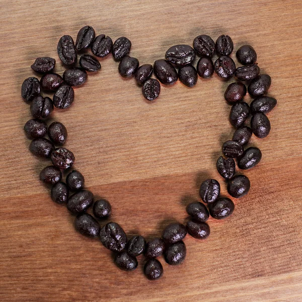 Symbol of love made of coffee. Heart, romantic and energetic. — Stock Photo, Image