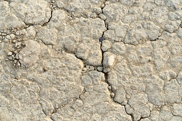 Pedra dividida bege com rachaduras. — Fotografia de Stock