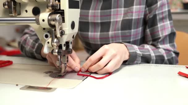 Seamstress using sewing machine for making medical mask — Stock Video