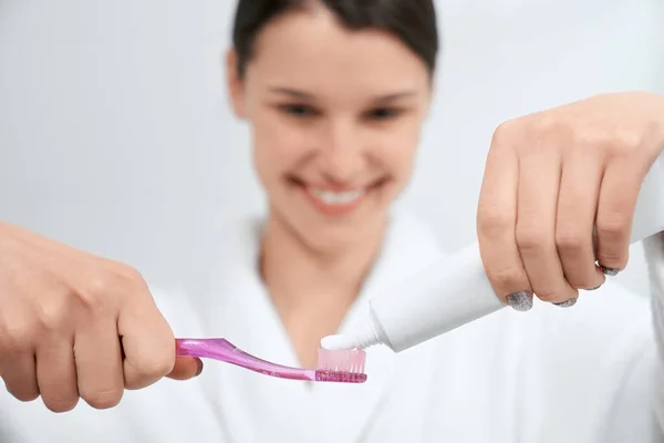 Woman preparing for cleaning teeth at home. — Stock Photo, Image