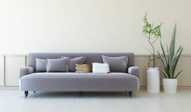 Beyaz oturma odasının içinde kanepe, ahşap zeminde güneş ışığı, büyük bir duvarda dekor. Renkli elementlerin iç mimarisi ile kuzeye dönük. 3B illüstrasyon