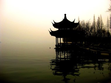 Pagoda on misty lake clipart
